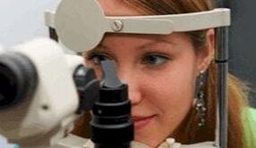 Woman undergoing an eye exam